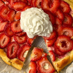 strawberry and mascarpone filled galette served with whipped cream