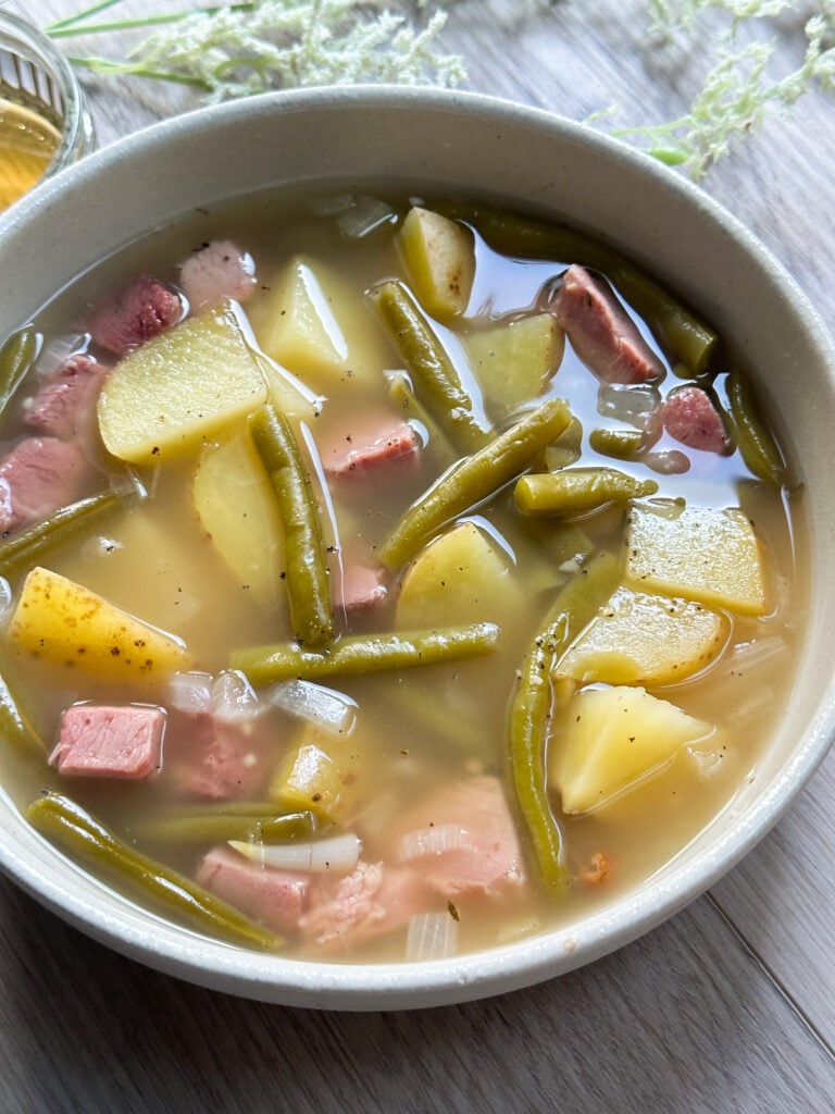 pa dutch ham and stringbean soup in a white bowl