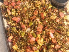 crispy bacon brussel sprouts perfect for the holidays on a sheet pan served with balsamic honey glaze