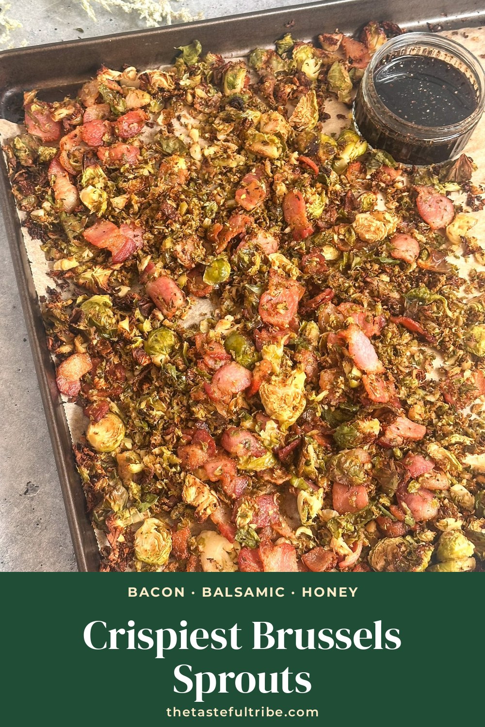 Sheet pan of crispy roasted brussels sprouts with bacon and balsamic