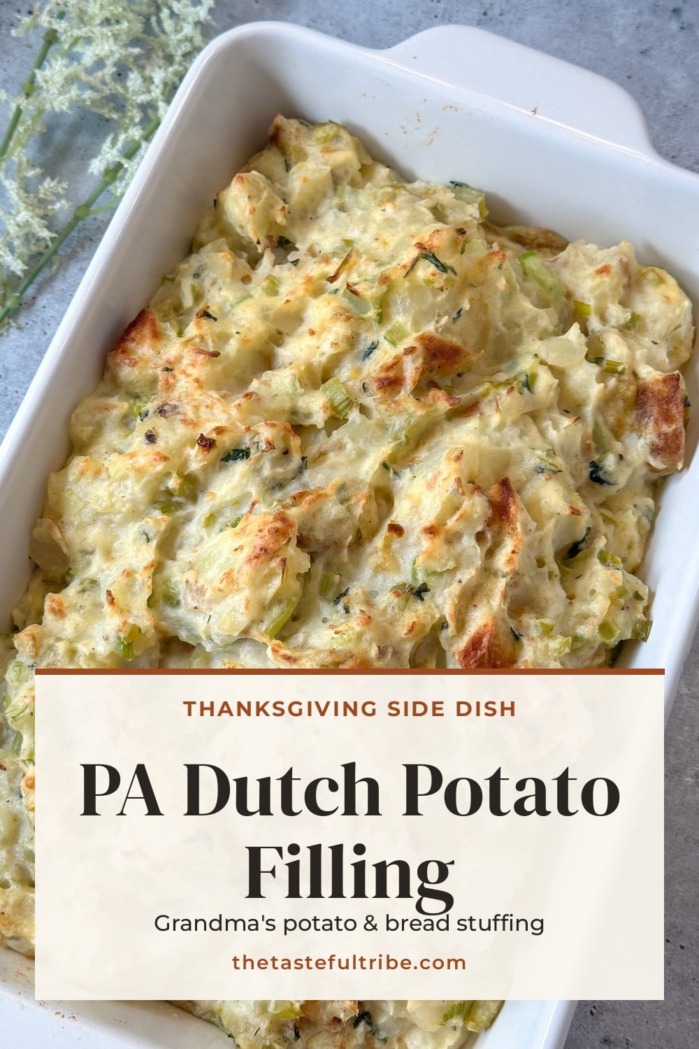 Baked PA Dutch potato filling with golden edges in a white casserole dish