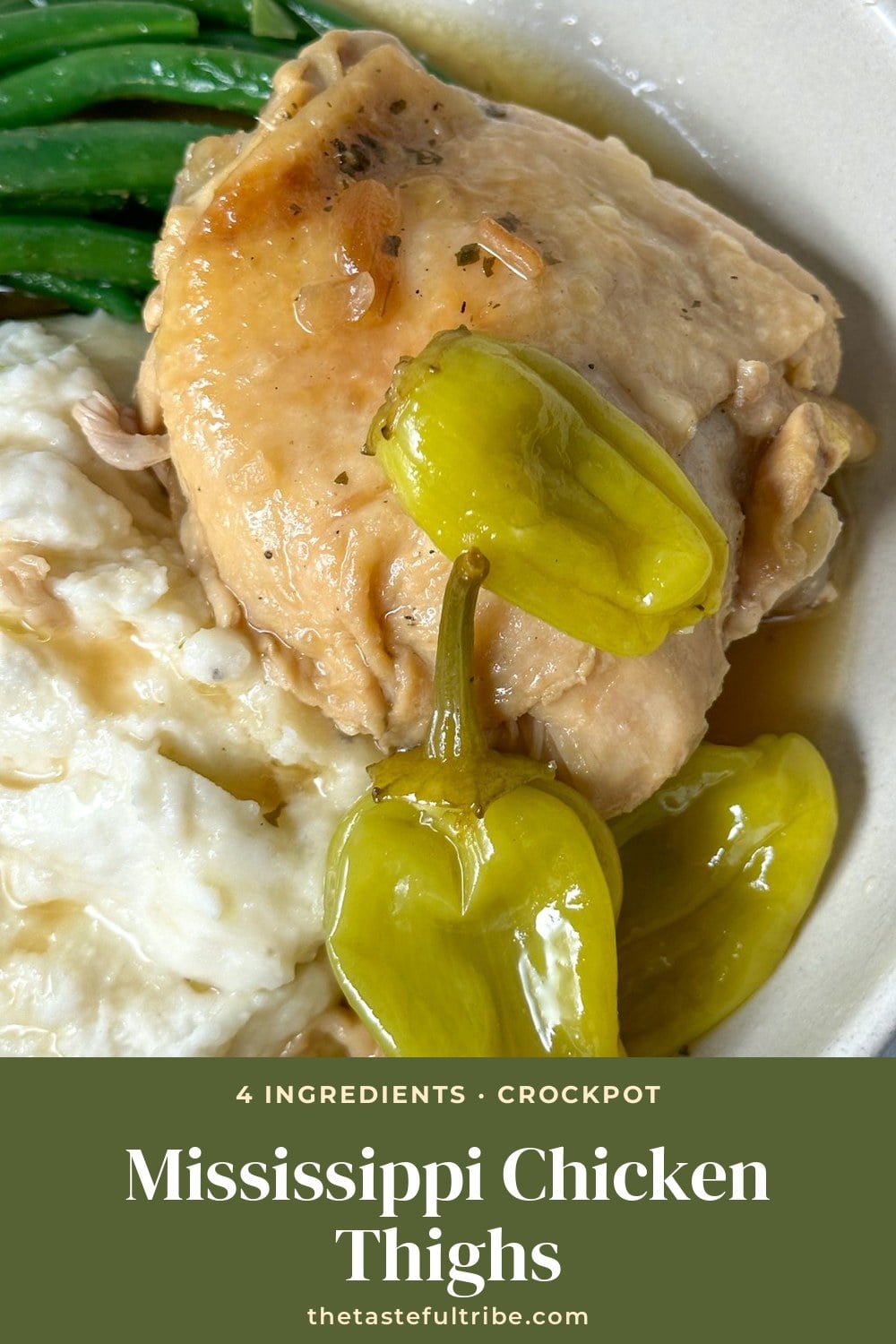 Close-up of slow cooker Mississippi chicken thighs with pepperoncini peppers over rice
